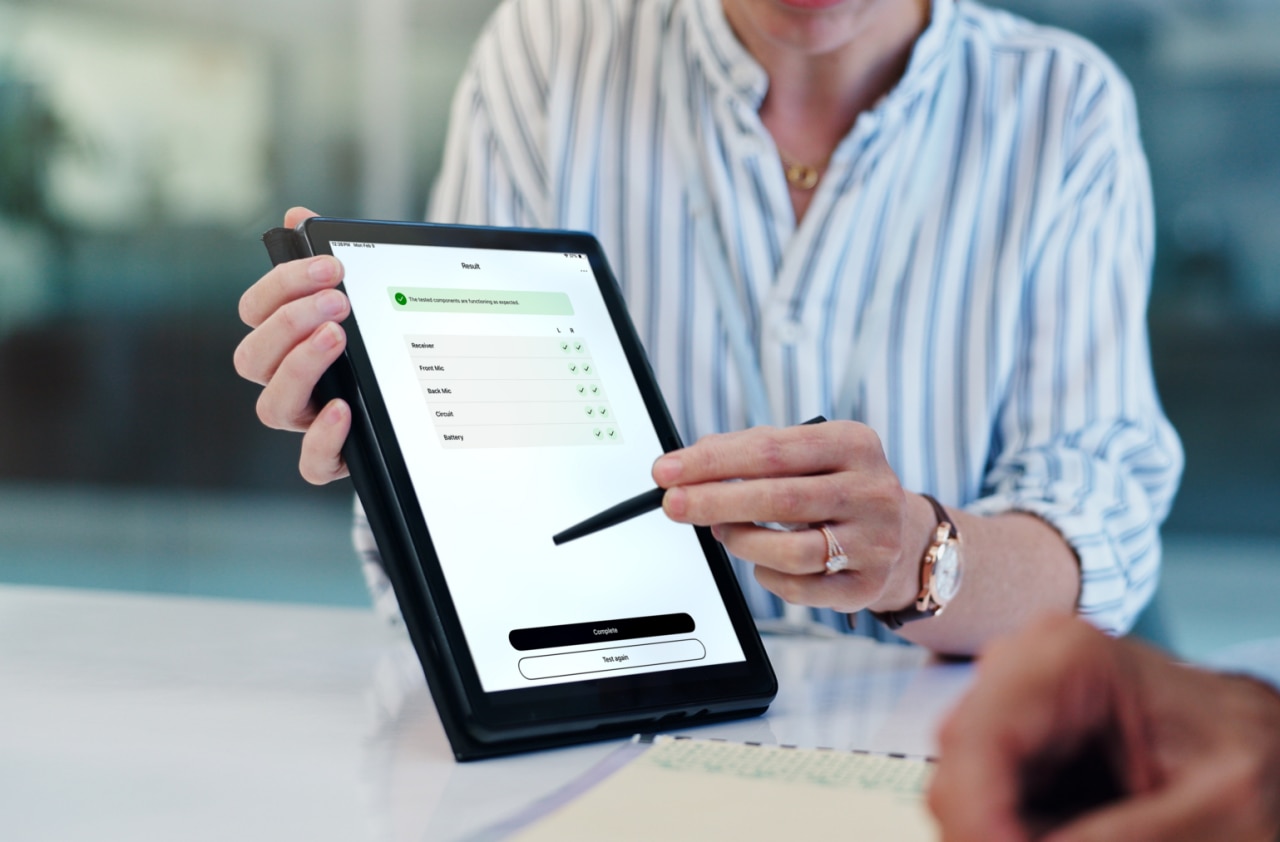 Unrecognizable businesswoman hands holding tablet