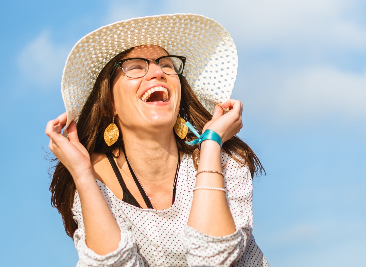 happiness woman panama hat laughing